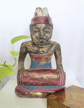 Tabletop Decor: Hand carved Balinese wooden sculpture of a musician.