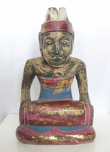 Tabletop Decor: Hand carved Balinese wooden sculpture of a musician.