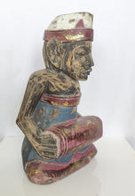 Tabletop Decor: Hand carved Balinese wooden sculpture of a musician.