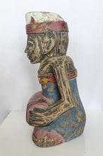 Tabletop Decor: Hand carved Balinese wooden sculpture of a musician.