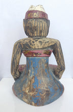 Tabletop Decor: Hand carved Balinese wooden sculpture of a musician.