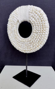 Home Decor - Table / Wall Ornament. Irian Jaya Tribal Cowrie Shell Necklace mounted on a custom made stand.
