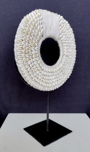 Home Decor - Table / Wall Ornament. Irian Jaya Tribal Cowrie Shell Necklace mounted on a custom made stand.