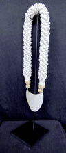Home Decor. Mother Of Pearl Crescent Necklace with Shells and Wooden Beads on stand.