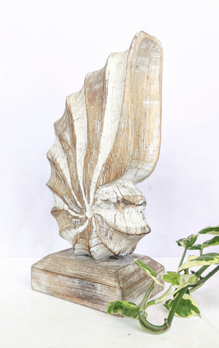 Home Decor: Tabletop Showpiece.
Wooden Decorative Nautilus Shell On Stand.