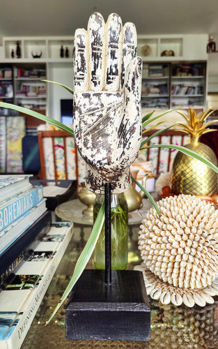 Home Decor. Tabletop Ornament. Buddha Hand Sculpture in Wood mounted on rustic wooden base.