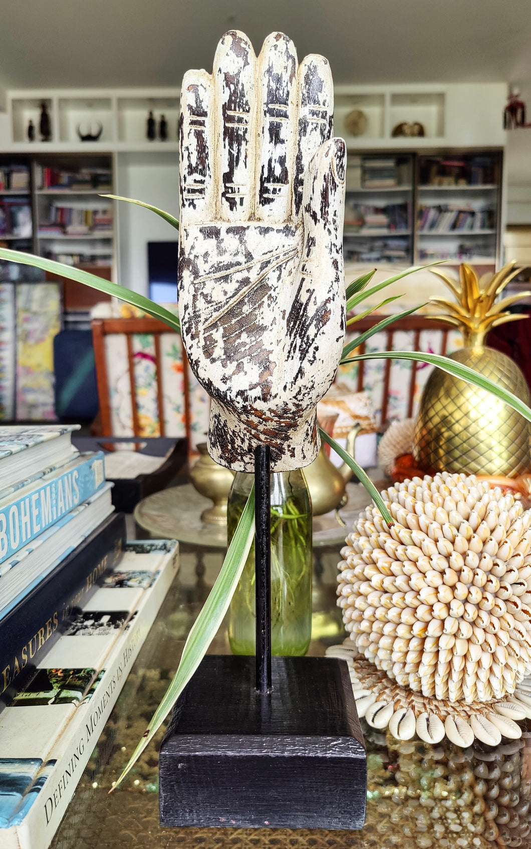 Home Decor. Tabletop Ornament. Buddha Hand Sculpture in Wood mounted on rustic wooden base.