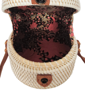 HANDBAG: HANDWOVEN OVAL SLING / CROSSBODY BRAIDED BAG.