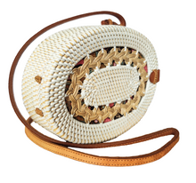 HANDBAG: HANDWOVEN OVAL SLING / CROSSBODY BRAIDED BAG.