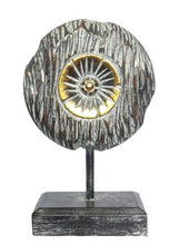 Table Decoration.
Decorative hand carved wooden floral disc on stand.