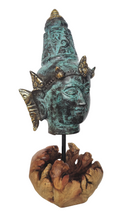 Home Decor Idol. Bronze Lord Vishnu Head Statue on a driftwood base.