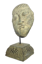 Home Decor: Table - Outdoor Idol.
Sleeping buddha head sculpture on a floral base in stone.