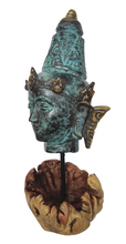 Home Decor Idol. Bronze Lord Vishnu Head Statue on a driftwood base.