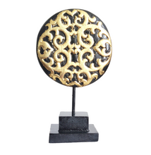 TABLE DECOR: Floral inspired beautiful Asian carved wooden disc mounted on a stand.