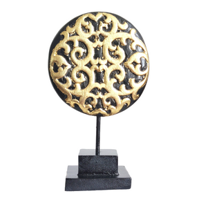 TABLE DECOR: Floral inspired beautiful Asian carved wooden disc mounted on a stand.