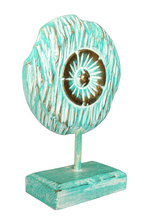 Table Decoration. Decorative hand carved wooden floral disc on stand.