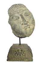 Home Decor: Table - Outdoor Idol.
Sleeping buddha head sculpture on a floral base in stone.