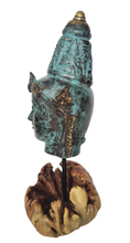 Home Decor Idol. Bronze Lord Vishnu Head Statue on a driftwood base.