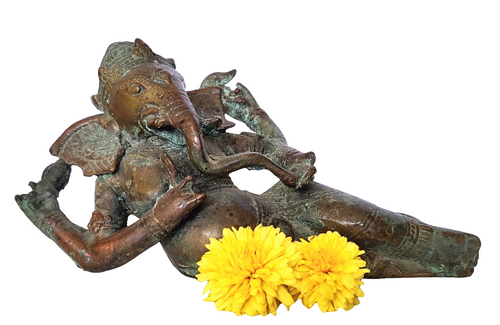 Home Decor: Tabletop Statue. Reclining Ganesha Statue in bronze.