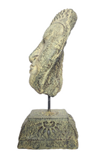 Home Decor: Table - Outdoor Idol.
Sleeping buddha head sculpture on a floral base in stone.