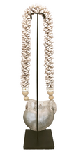 Home Decor. Mother Of Pearl Crescent Necklace with Shells and Wooden Beads on stand.
