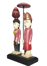 Home Decor. Tabletop Sculpture.
Hand Carved and Painted Wooden Figures on a rustic base - Melasti, a Hindu Ceremony.