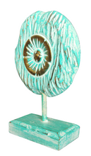 Table Decoration. Decorative hand carved wooden floral disc on stand.