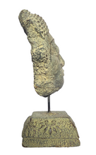 Home Decor: Table - Outdoor Idol.
Sleeping buddha head sculpture on a floral base in stone.
