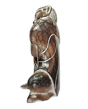 Table Decor. Handcrafted Wooden Dreaming Buddha Sculpture, Resting Head on Knee.