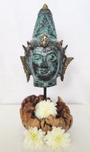 Home Decor Idol. Bronze Lord Vishnu Head Statue on a driftwood base.