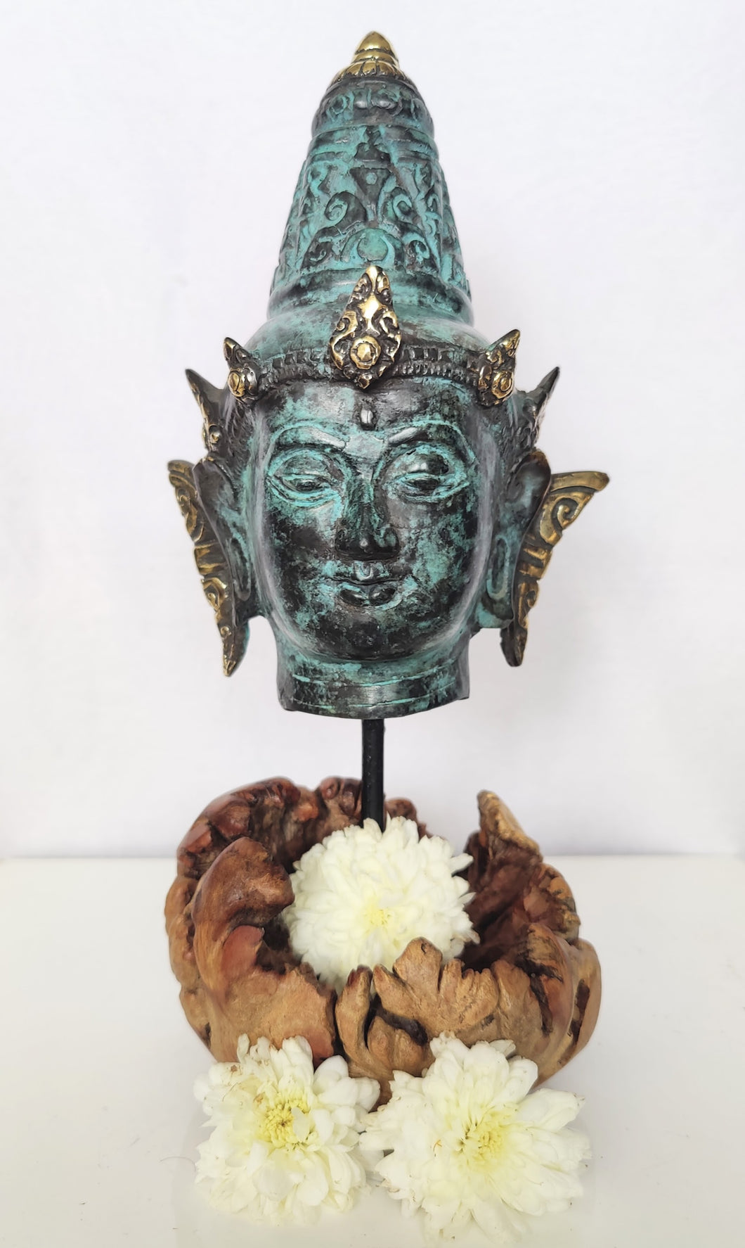 Home Decor Idol. Bronze Lord Vishnu Head Statue on a driftwood base.