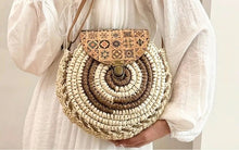 Women's Handbag: Handwoven Straw Sling / Crossbody Shoulder Bag with Floral flap and Adjustable strap.
