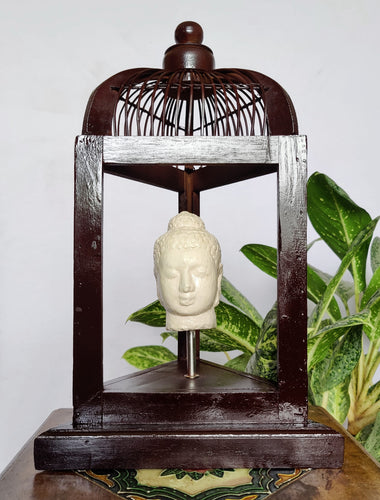 Home Decor: Unique Meditating Buddha Stone Bust Mounted in a open Bird Cage Frame.