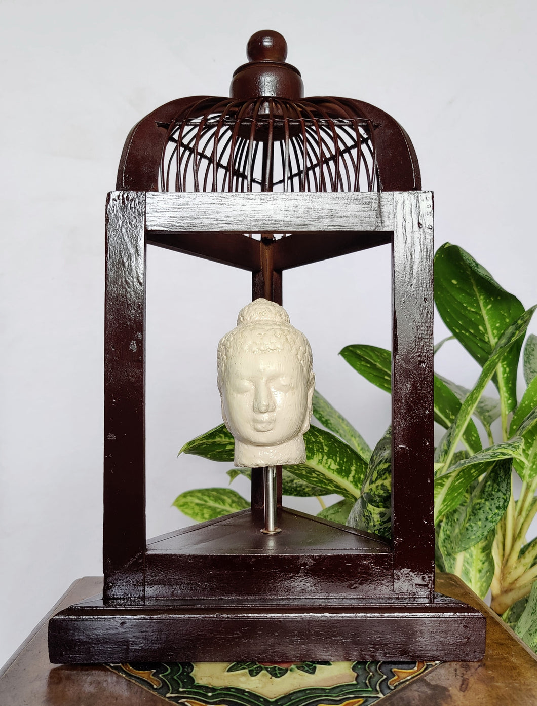 Home Decor: Unique Meditating Buddha Stone Bust Mounted in a open Bird Cage Frame.
