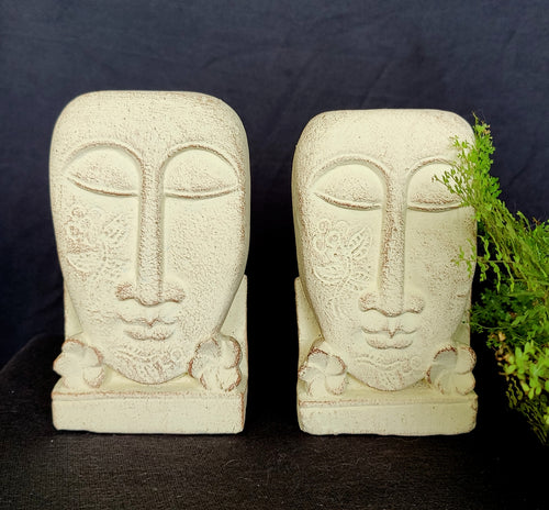 Home Decor. Table - Garden Accents. Pair of Hand Carved stone Face Sculptures with floral design, 