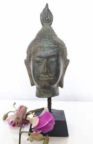Table Decor Sculpture. Bronze Lord Buddha Head On a Wooden base.