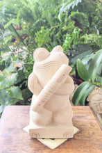 TABLETOP / GARDEN DECOR / FIGURINE: Handcrafted Cute Frog Sculpture in sandstone playing the flute.