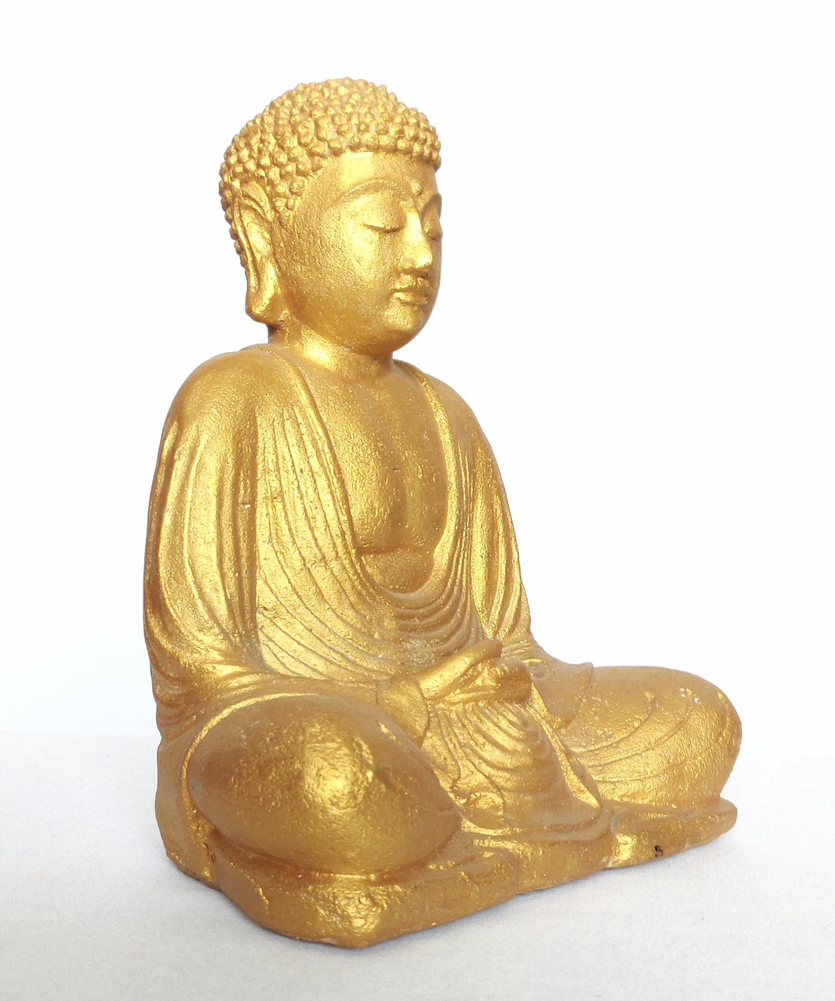 Golden buddha statue, gold buddha, meditating concept, calm