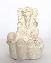Home Decor. Candle - Incense stick holder. Lord Ganesha seated on a hand in stone.