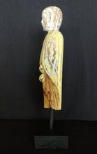 Home Decor.
Contemporary Serene Buddhist Monk Wooden Statue mounted on a rustic wooden base.