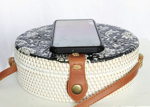 HANDBAG: Decoupage Handwoven Round Rattan Bag in Floral Design and Batik Lining.