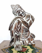 Table Decor. Handcrafted Wooden Dreaming Buddha Sculpture, Resting Head on Knee.