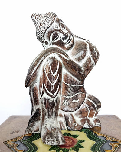 Table Decor. Handcrafted Wooden Dreaming Buddha Sculpture, Resting Head on Knee.