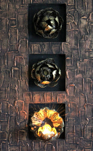 WALL ART/DECOR: EXQUISITE THREE PIECE METAL LOTUS FLORAL WALL ART PANEL WITH TEALIGHT CANDLE HOLDER.
